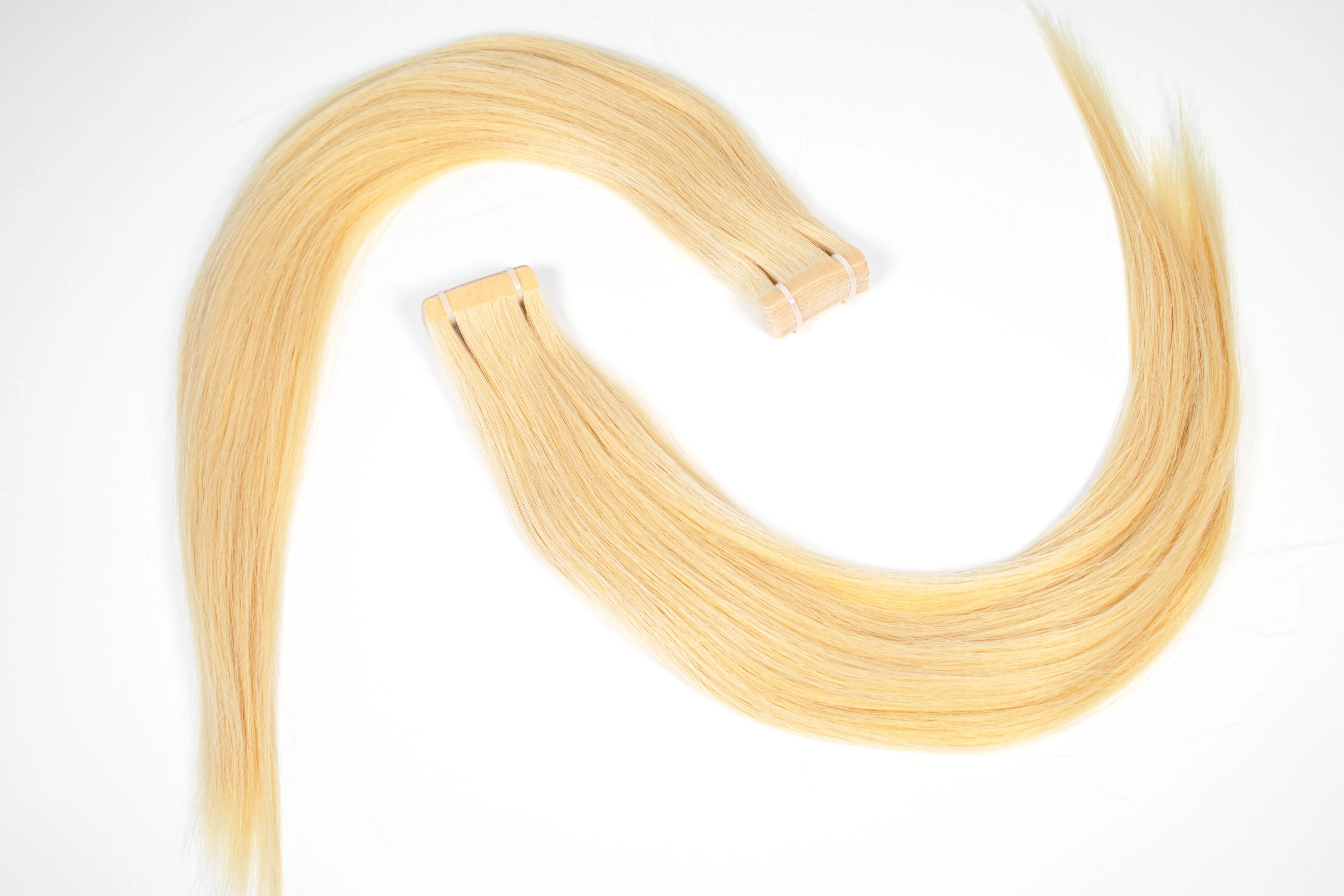 SHE Tape Extensions